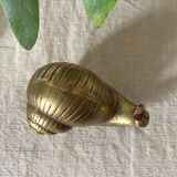 Golden brass snail