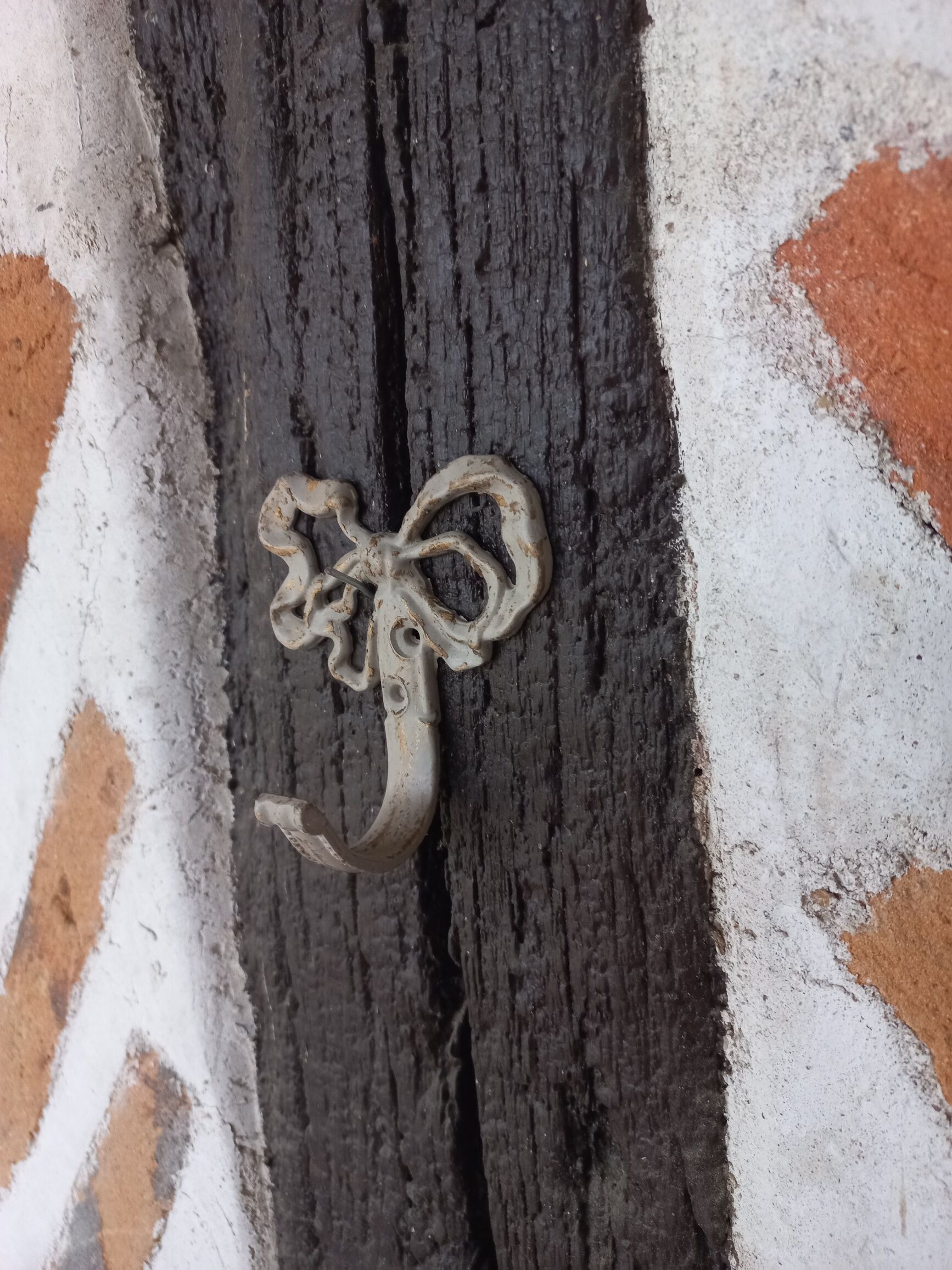 Patinated linen hook