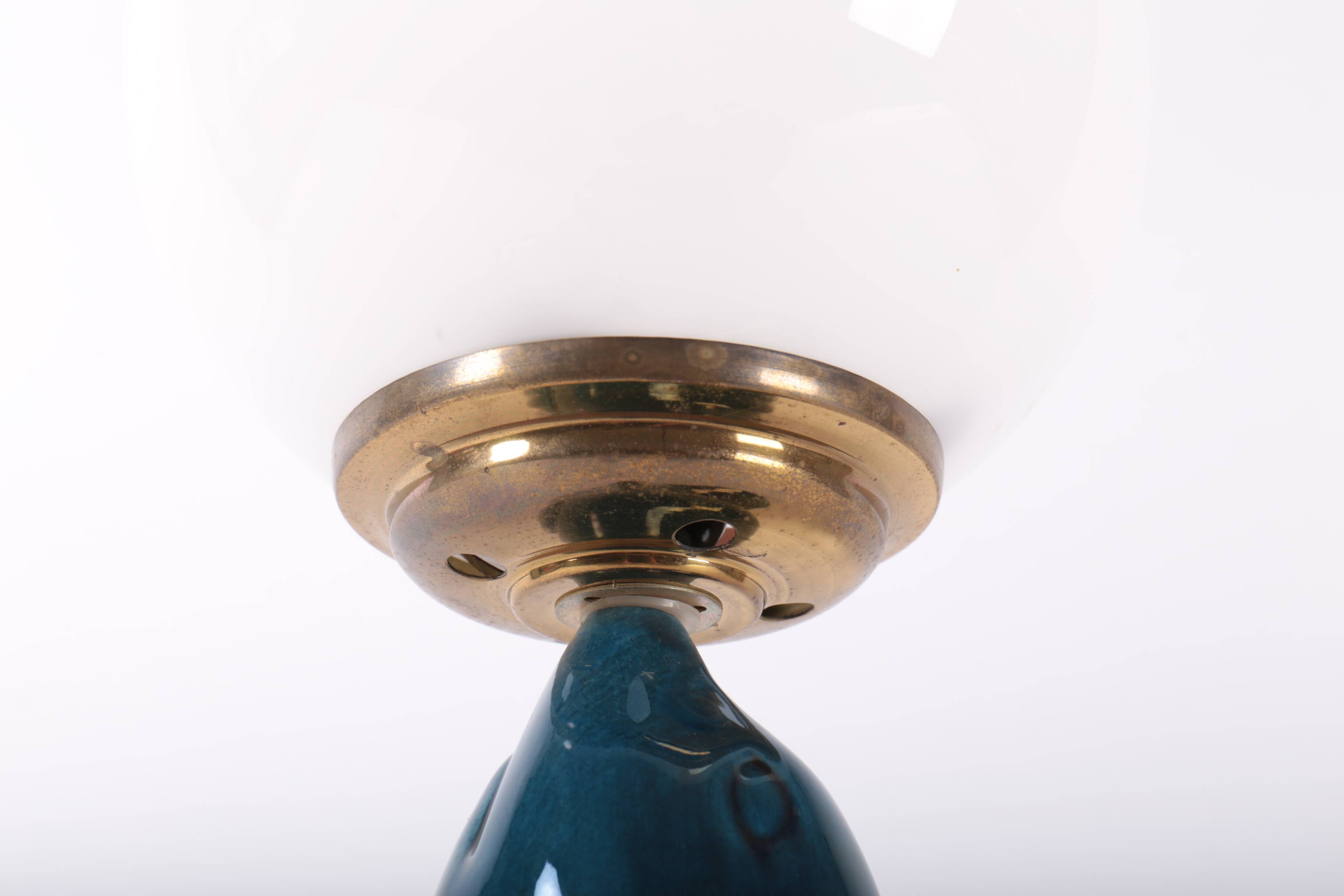 Blue ceramic sea lion lamp