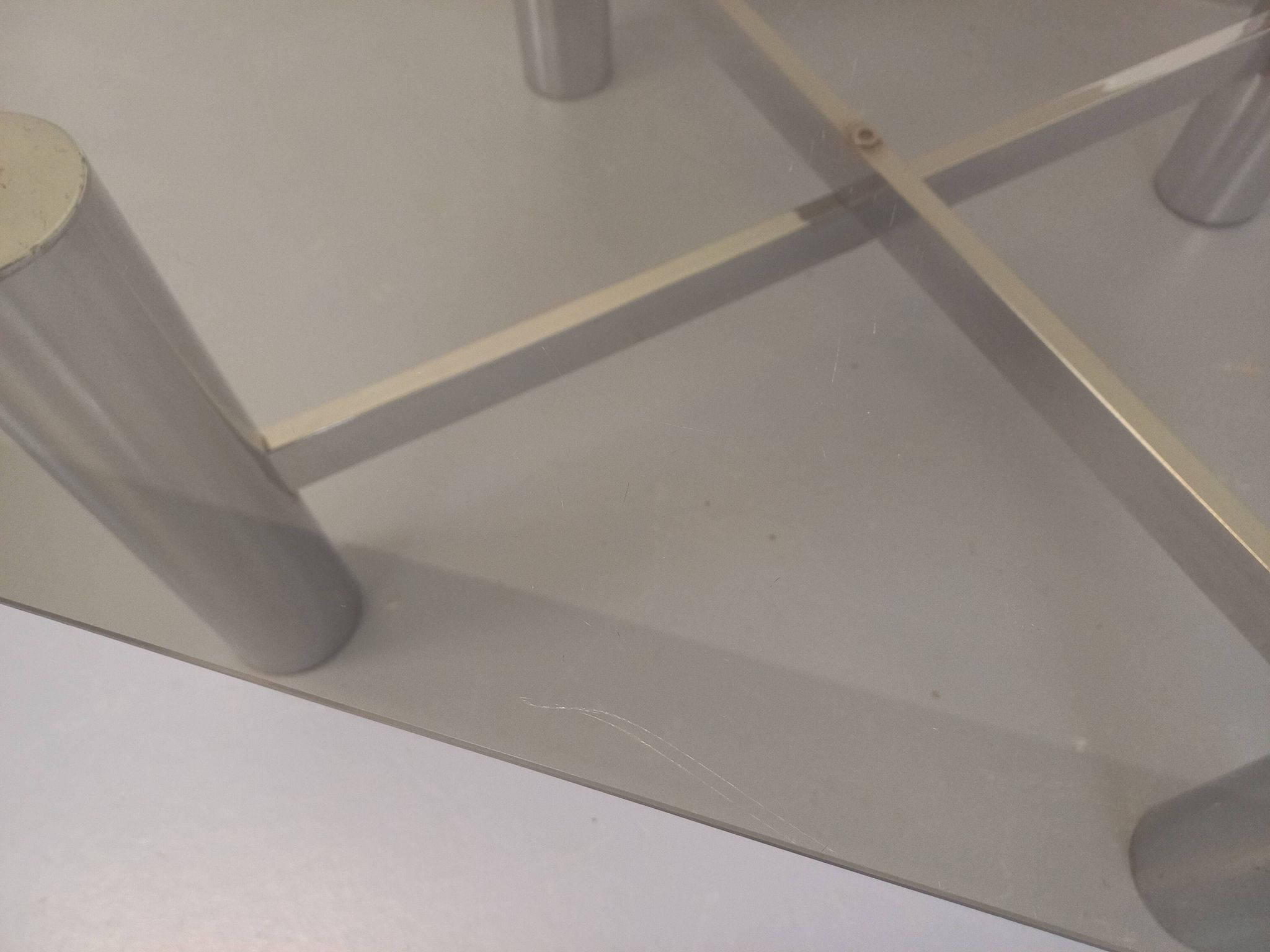 Square Italian vintage Space Age coffee table in smoked glass and metal.