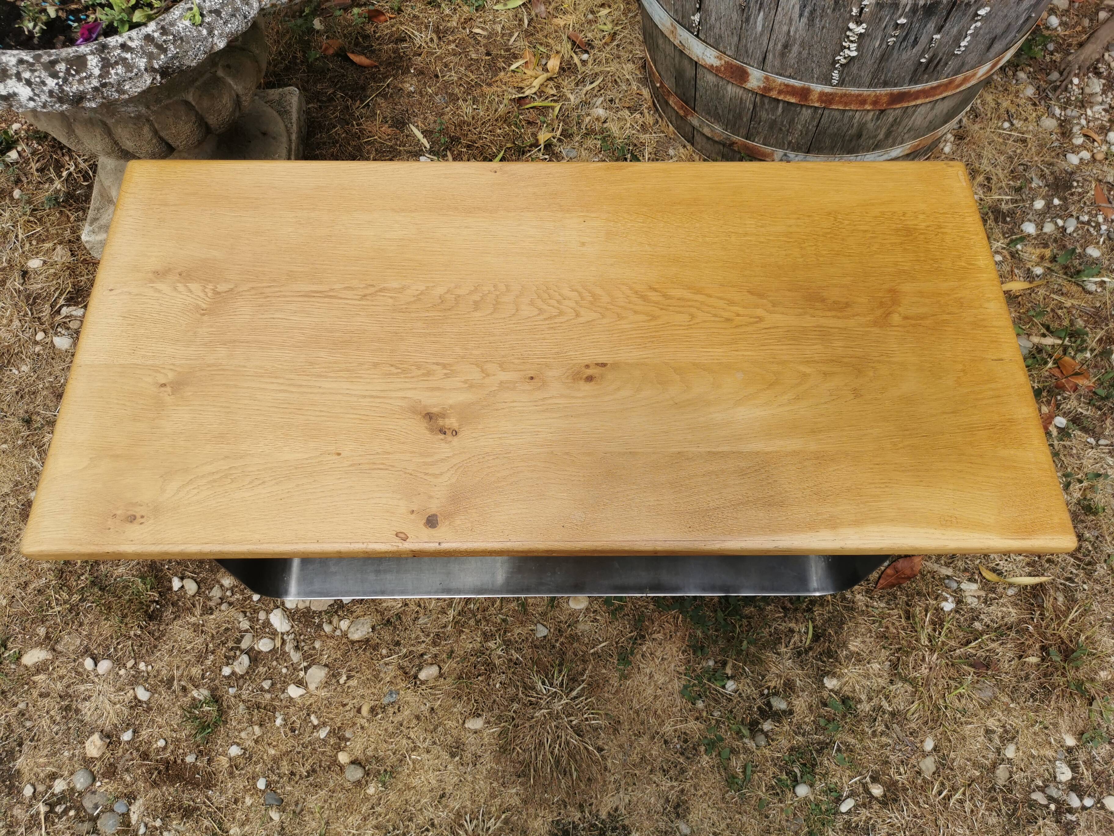 Designer coffee table in brushed stainless steel and light-tinted solid oak top