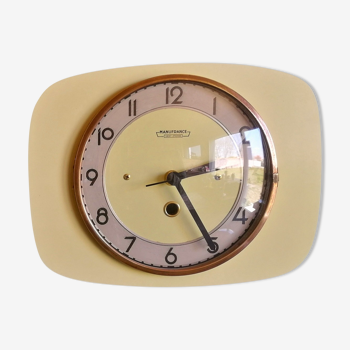 Horloge vintage pendule murale "Manufrance jaune Champagne"