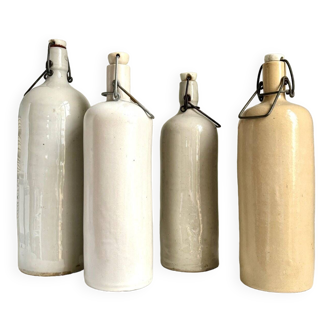 4 beige glazed stoneware bottles