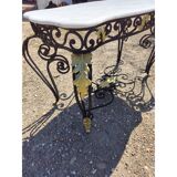 19th-century butcher's table made of wrought iron and twisted.