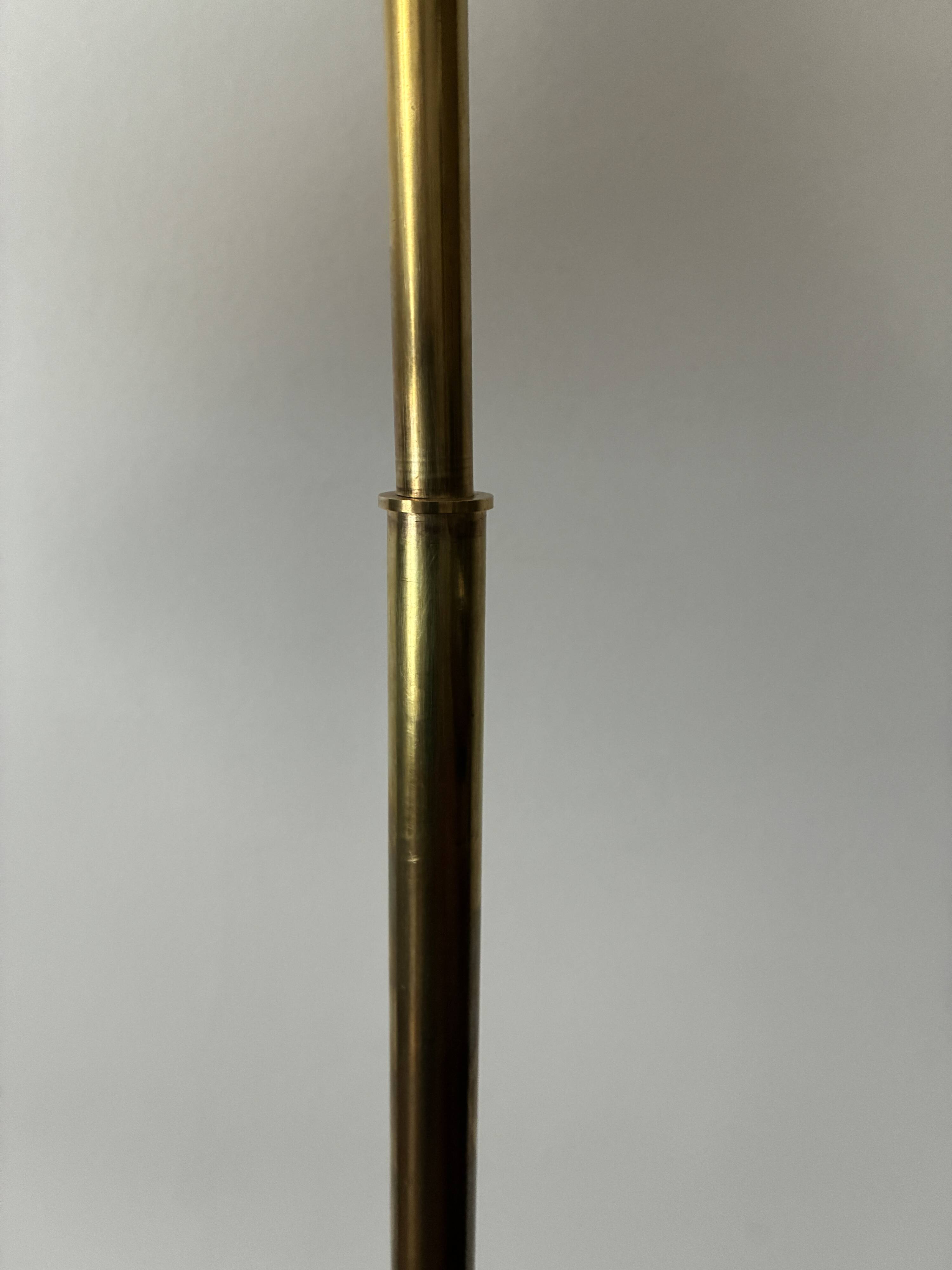 Adjustable Diabolo floor lamp in brass - 1950s