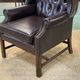 Chesterfield armchair with brown leather ears from the 1990s in very good condition
