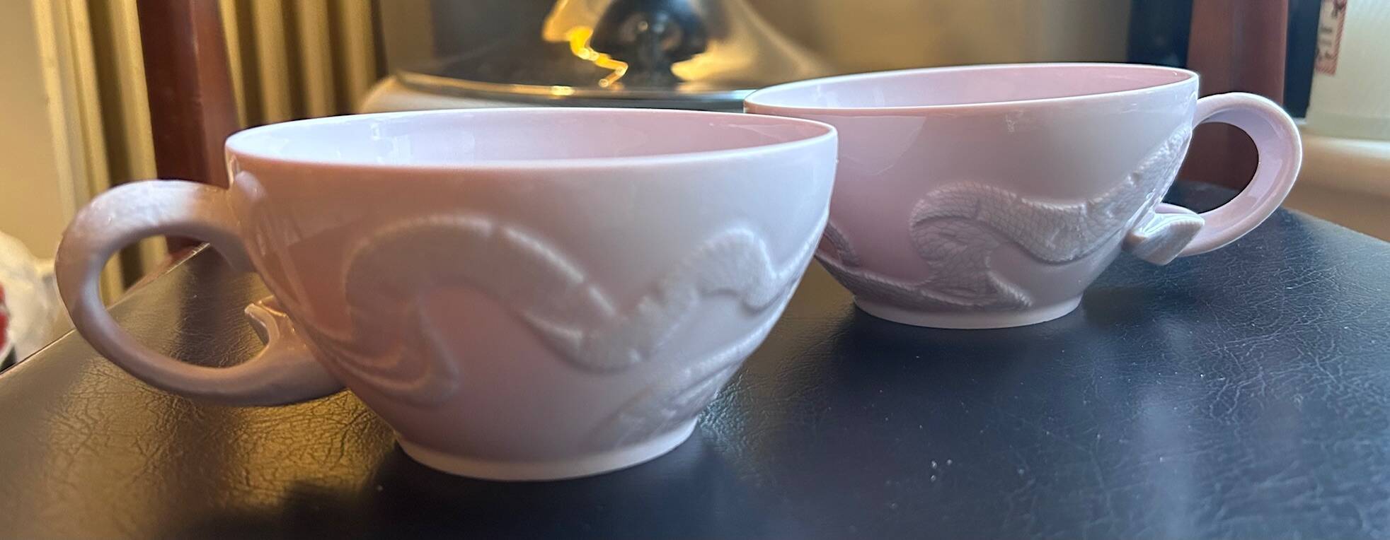 Two pink haviland porcelain teacups