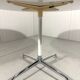 Round dining table by Charles & Ray Eames, Herman Miller, 1960s.