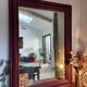 Large antique moulded mirror in wine red / plum (101 x 74 cm)