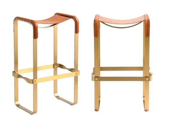Pair of backless bar stools, traveller style, in tobacco metal.