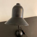 Articulated and adjustable black metal lamp