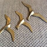 3 brass seagulls