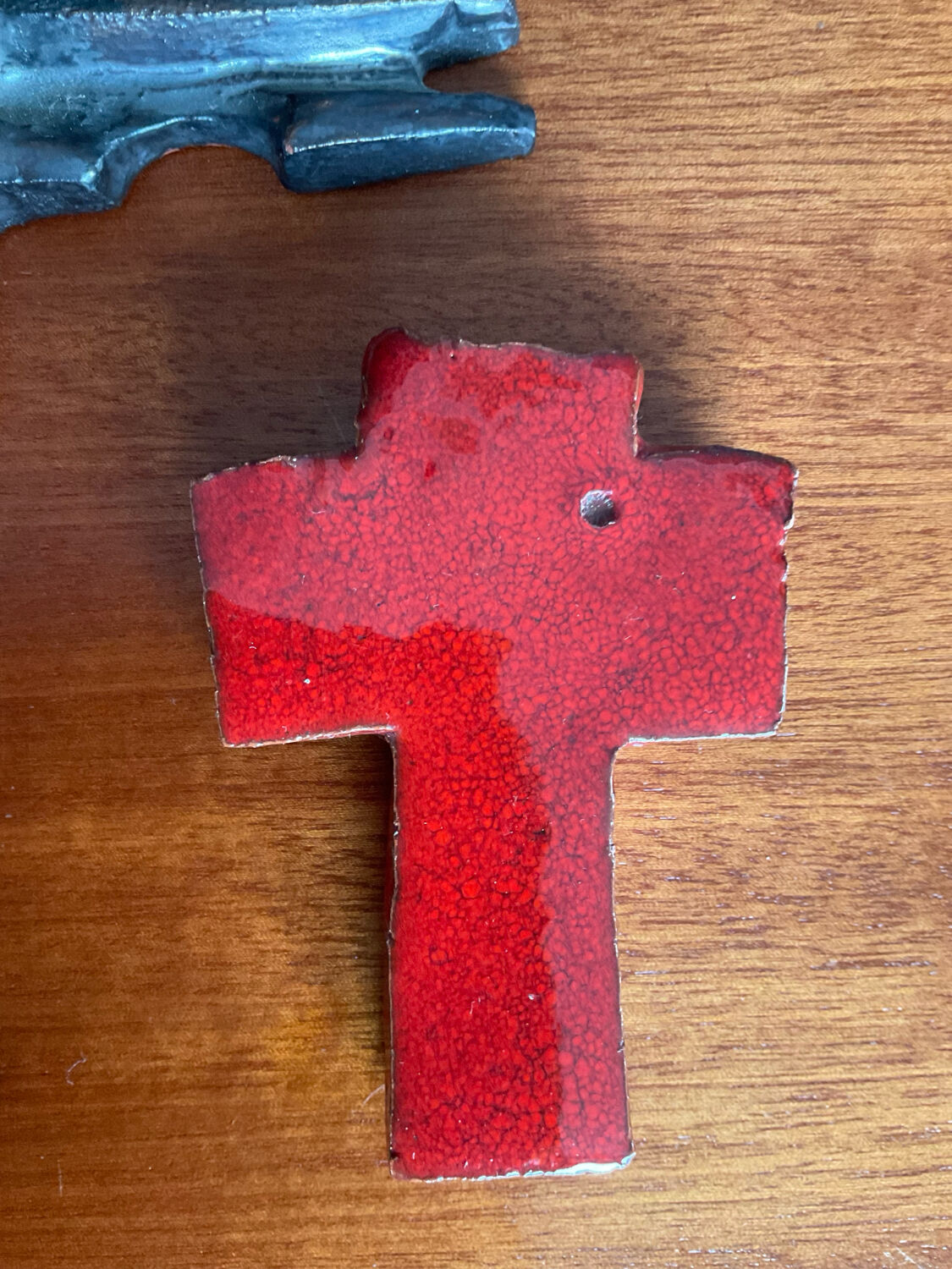 Vintage pair of glazed terracotta crosses