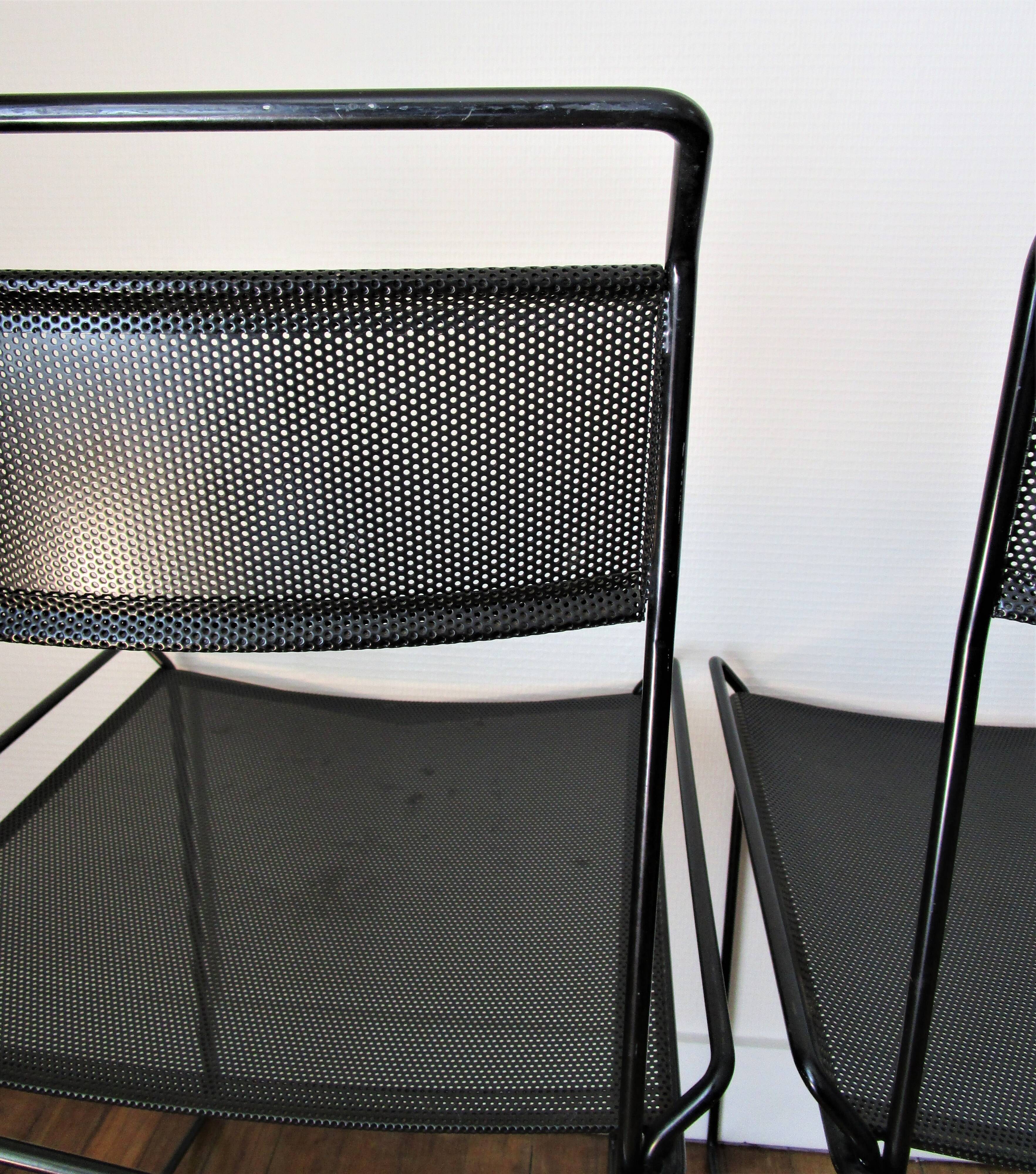 Pair of perforated metal steel chairs from the 80s