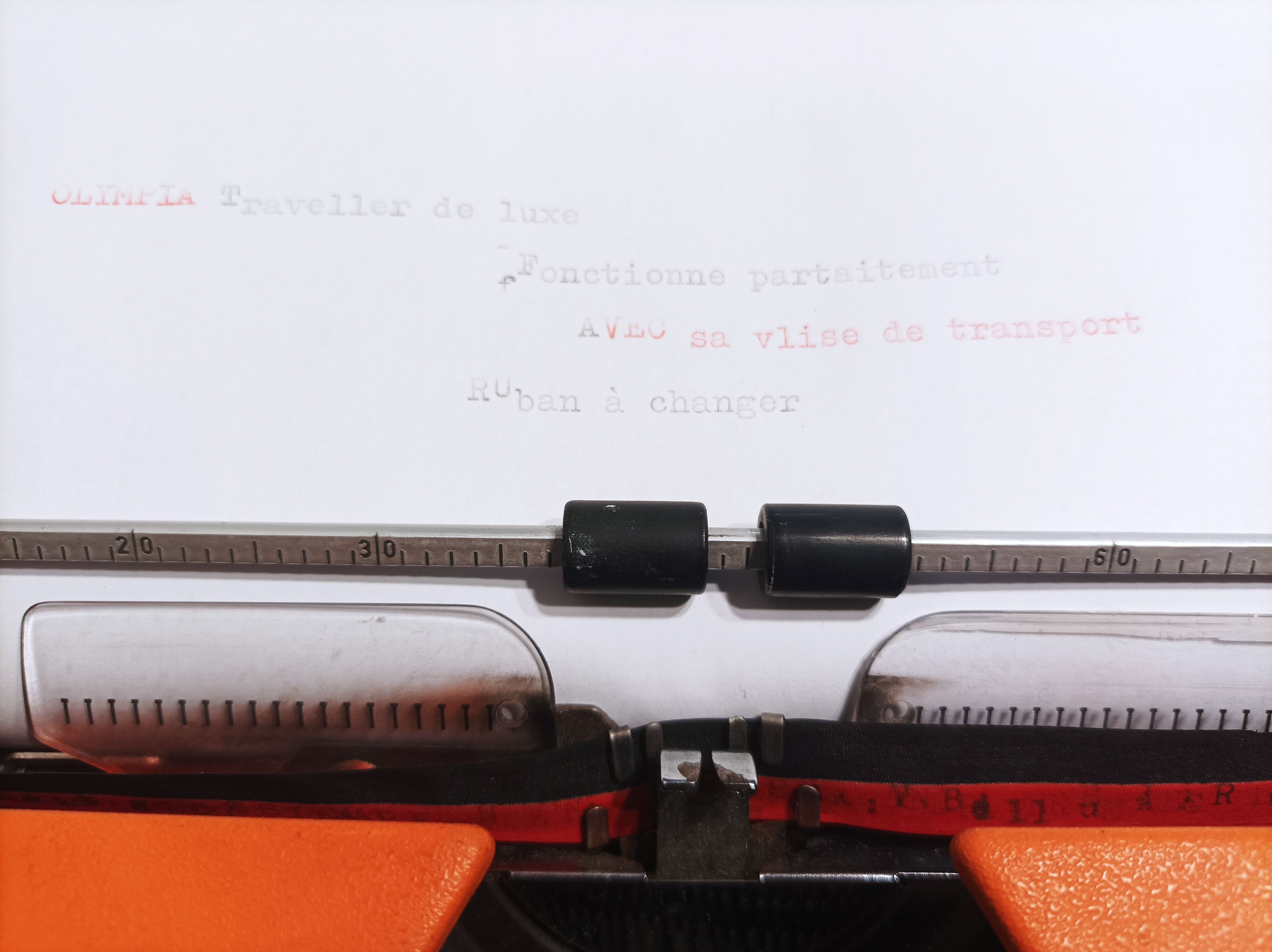 Olympia traveller luxury typewriter orange revised and new ribbon