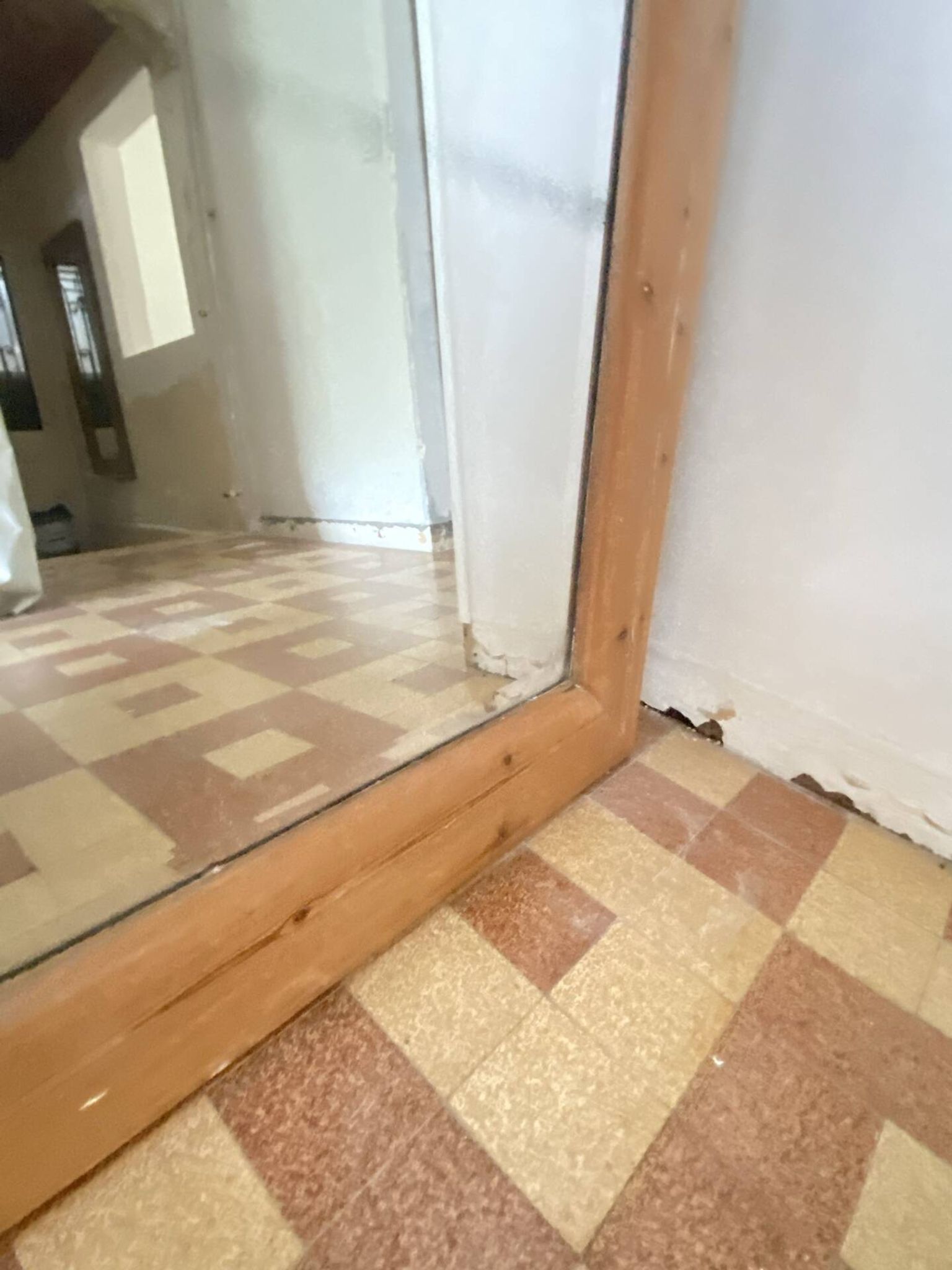Very large mirror in antique pine.