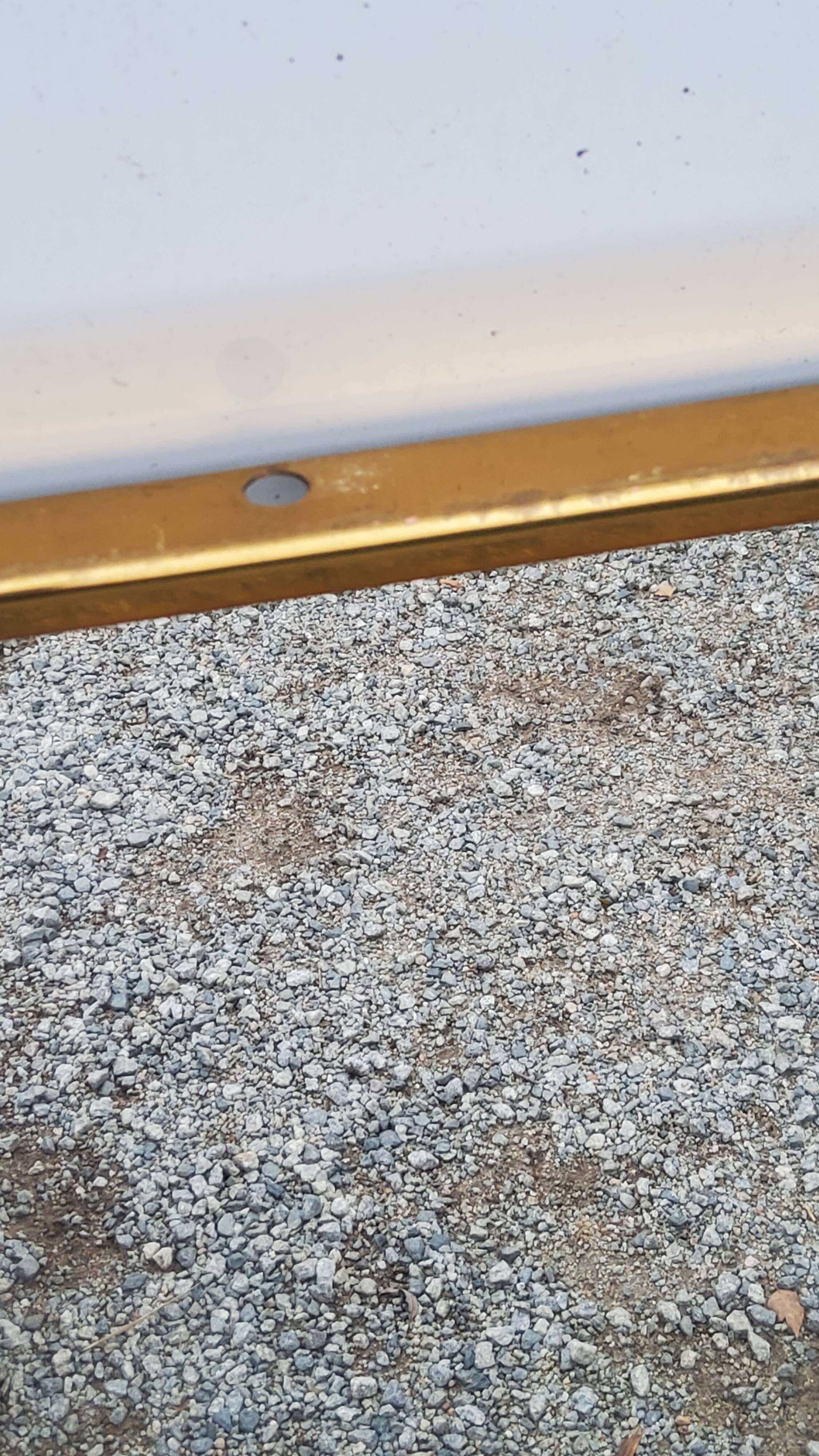 Mirror of the 70s in gilded metal, 60x35 cm