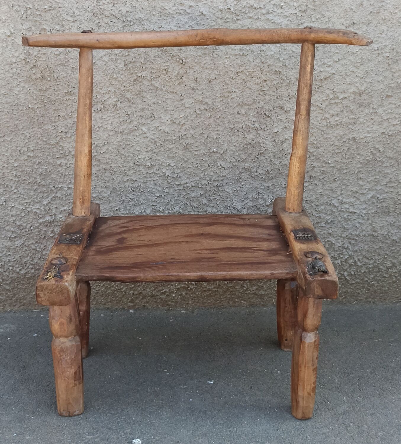 Antique wooden stool. Baoulé African art from Ivory Coast.