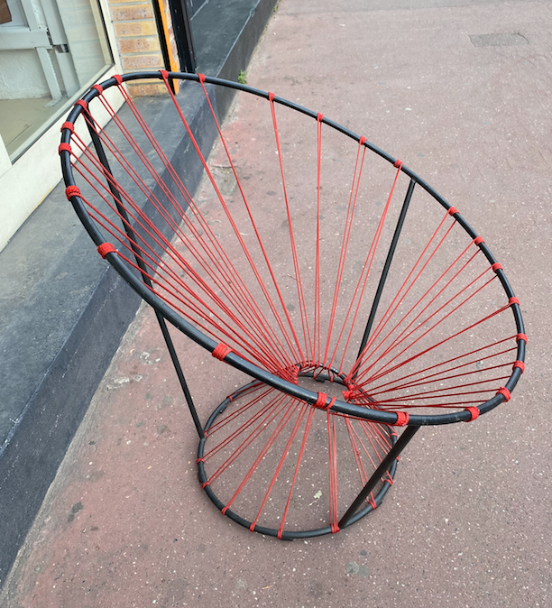 Red rope "cockroach" chair