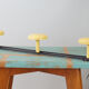 Yellow and black enamelled metal hook, 60s