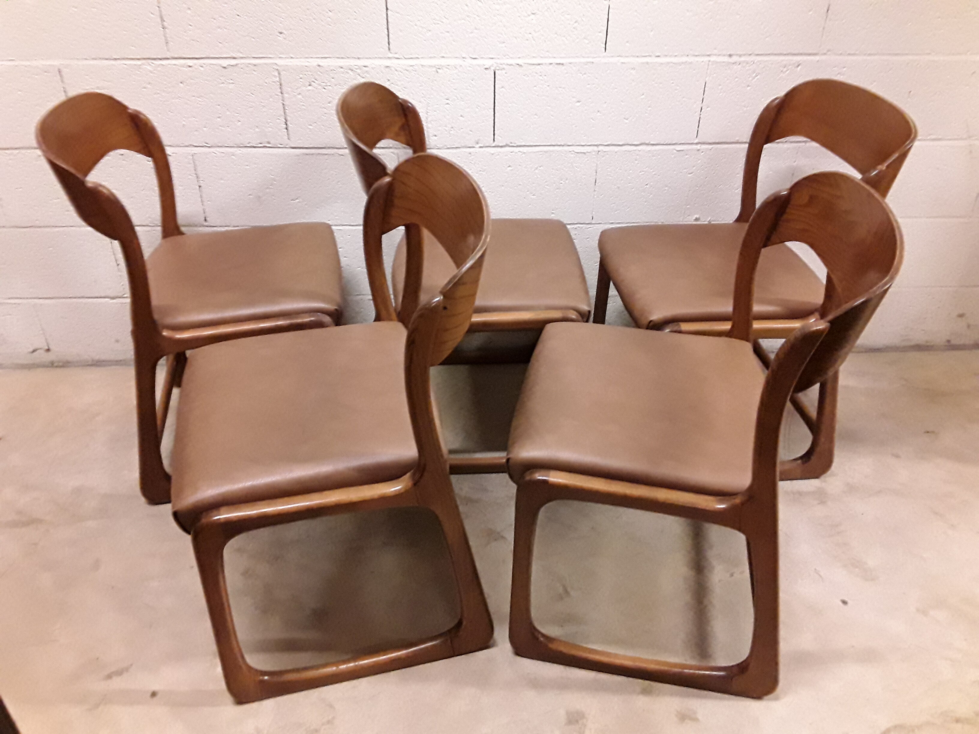 Following 5 chairs "sled" Baumann