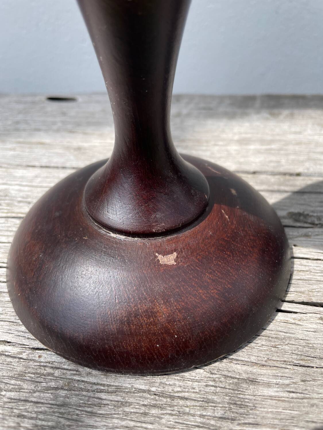Trio of large turned wooden candlesticks