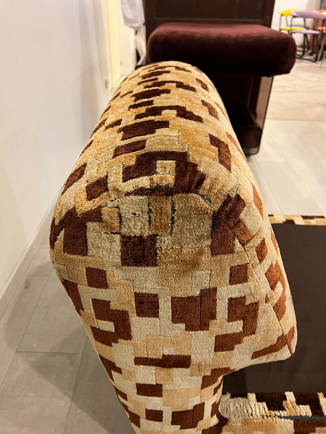 Vintage armchair from the 70s in beige and brown.