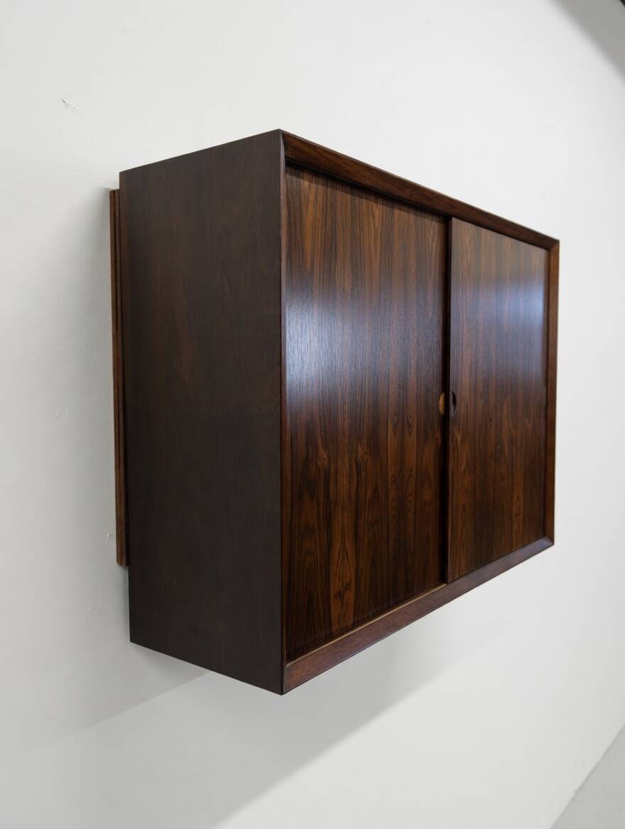 Cabinet mural en palissandre par poul cadovius pour cado.
