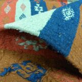 Authentic handmade Tunisian Berber kilim rug in orange wool.