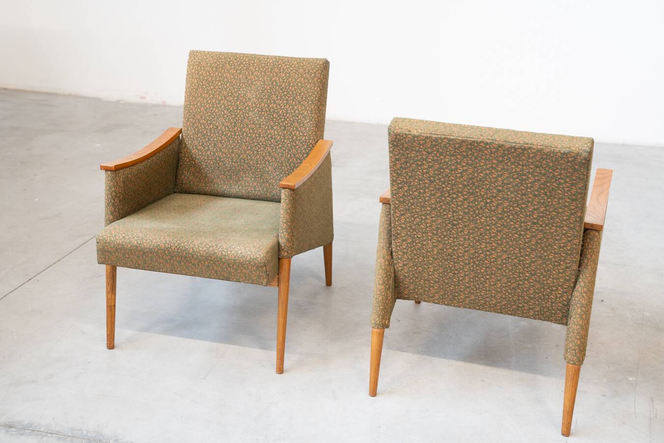 Pair of vintage armchairs in oak and embossed fabric, with old republished certificate of authenticity