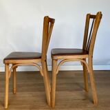 Four chairs Baumann 1960 with bars seated skaï brown label