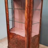 Louis xv showcase with a marble door