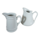 2 small white porcelain pitchers