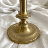 Antique brass candlestick in vintage baluster shape