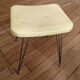 Vintage yellow leatherette stool from the 1950s