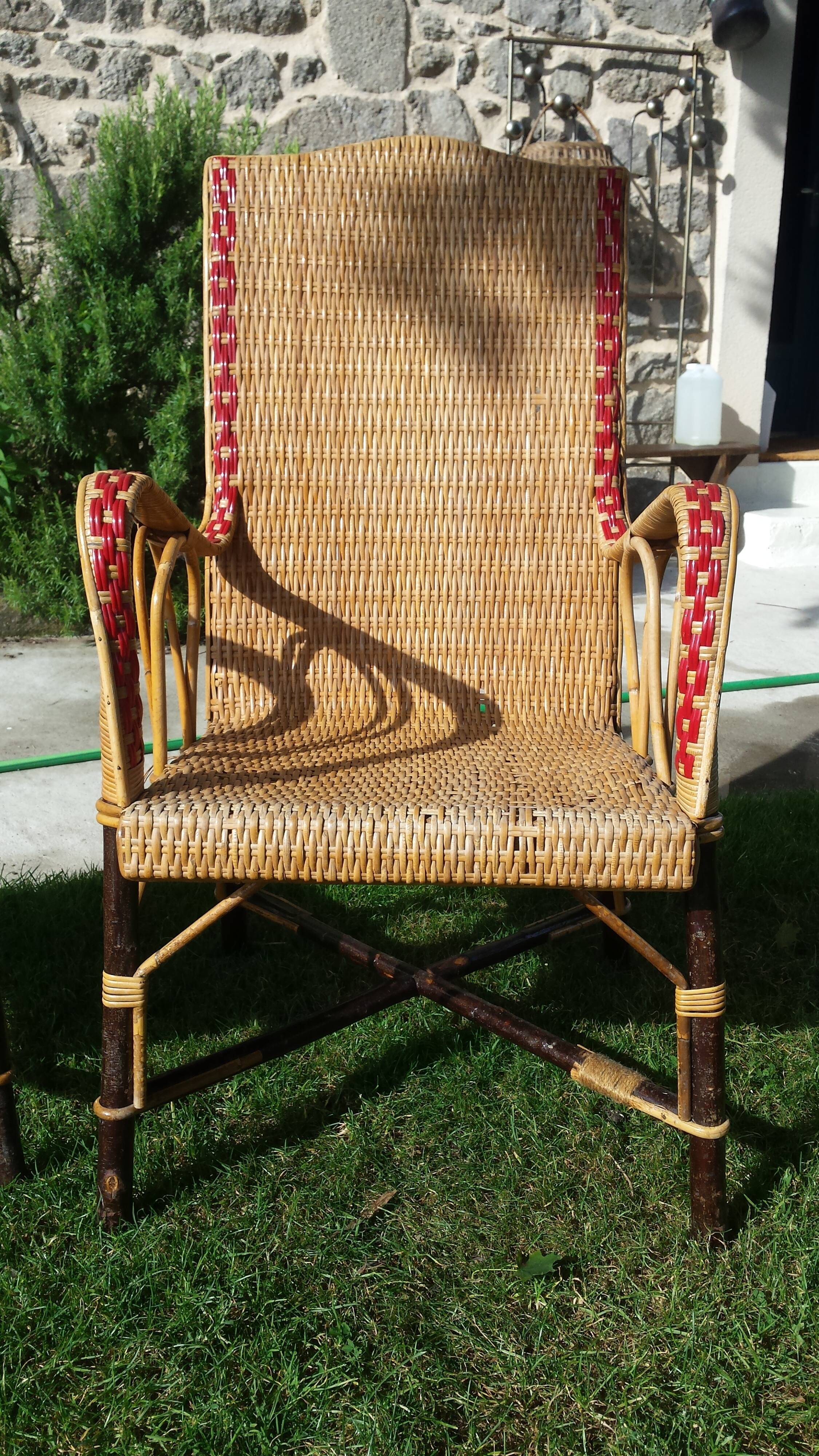 Wicker or rattan armchairs and bamboo