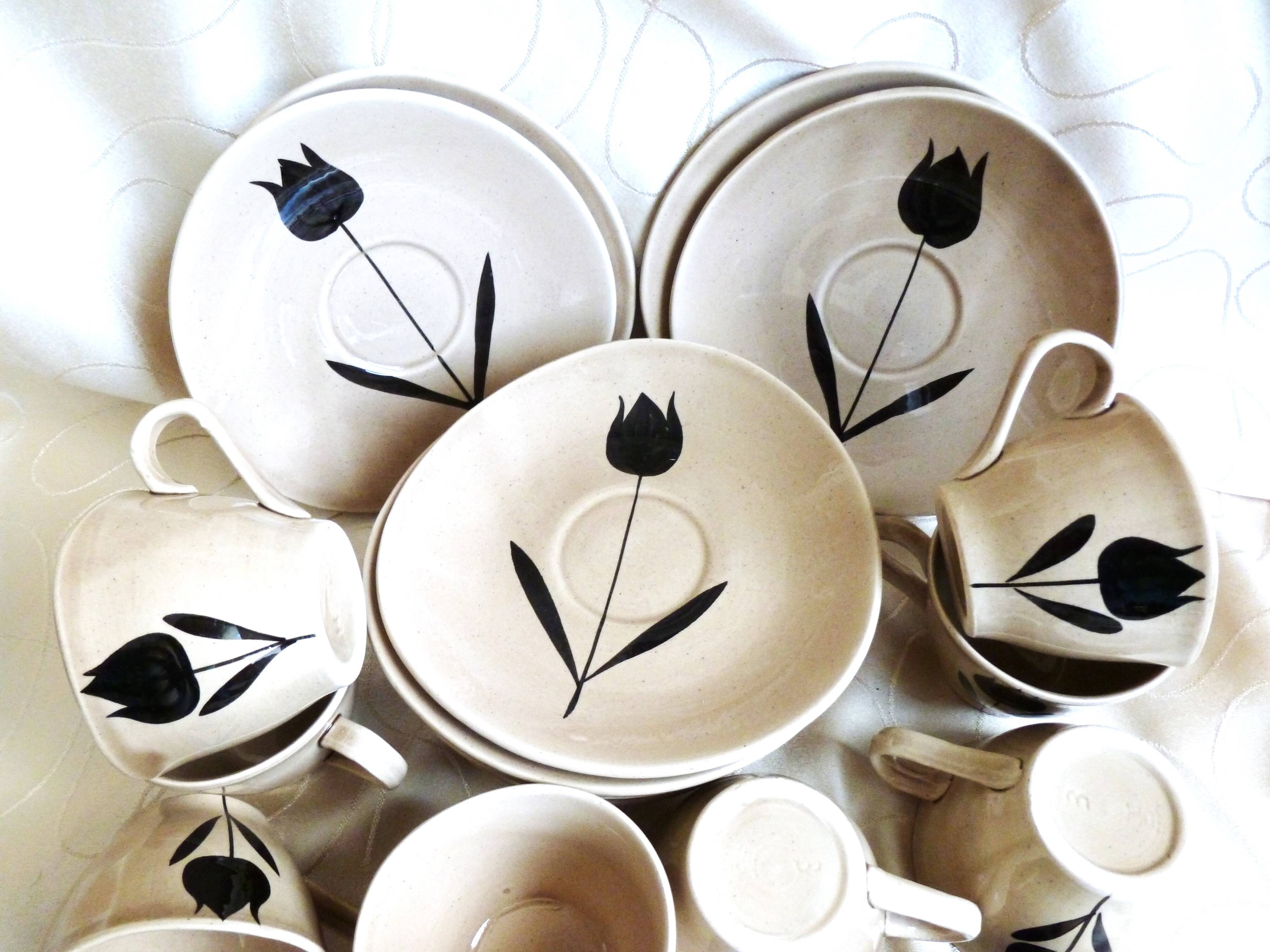 Vintage 23-piece Niderviller coffee set with hand-painted black tulip decor.