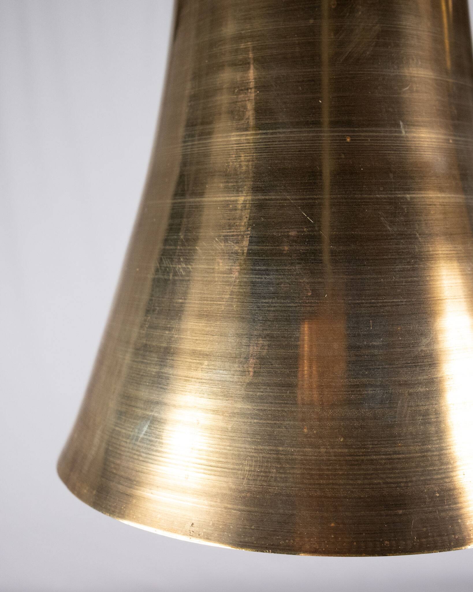 Pair of brass pendants, hourglass shape, 1960s