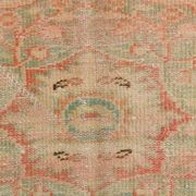 Tapis vintage rouge pâle