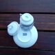Tasse miniature en porcelaine