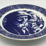 Blue enamelled earthenware wall plate with fisherman decor, Boch La Louvière, Belgium