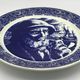 Blue enamelled earthenware wall plate with fisherman decor, Boch La Louvière, Belgium