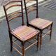 Two 19th-century carved chairs in solid wood and woven rope