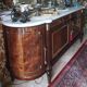 Louis XVI style sideboard in flame mahogany veneer.