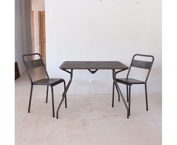 Pair of patinated metal chairs