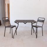 Pair of patinated metal chairs