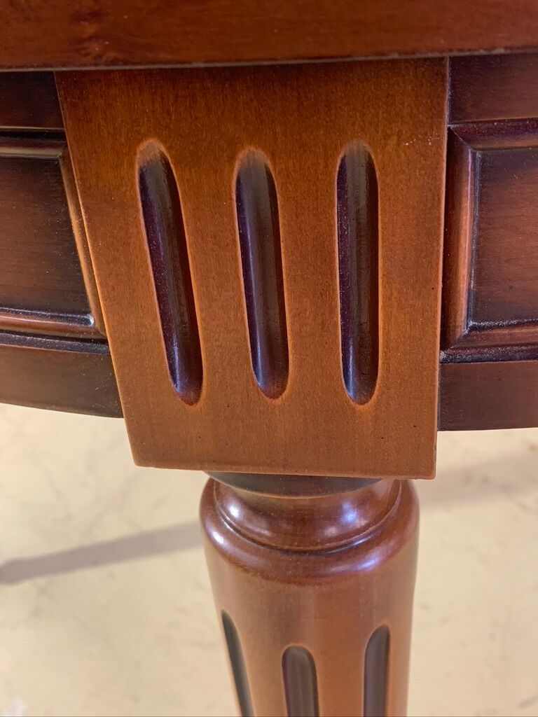 Louis XVl style round table in cherry with extensions