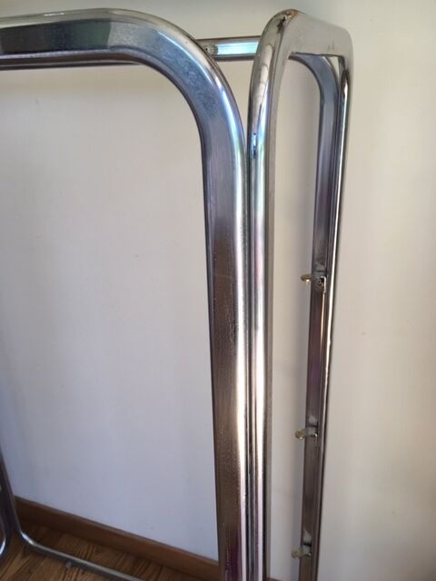 Chrome shelves and smoked glasses design