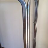 Chrome shelves and smoked glasses design