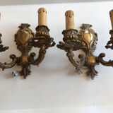 Pair of Louis XV style two-branch gilt bronze wall lights, small format and in good condition. Height 18 Width 20 cm